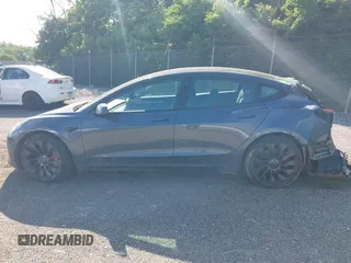 2023 Tesla Model 3 Performance z VIN 5YJ3E1ECXPF482320, wystawiony jako IAAI lot #42289417 z przebiegiem 31 296 mil mil oraz . Historia ofert i sprzedaży dostępna na DreamBid. Obrazek 15.