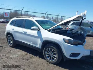 2019 Jeep Cherokee Latitude Plus with VIN 1C4PJMLB2KD355361, listed as a IAAI auction lot 41803131 with 95,168 mi miles. Bid and sale history available at carsss.com. Image 1.