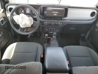 2024 Jeep Wrangler Sport S с VIN 1C4PJXDG9RW281804, выставлен на аукционе Copart как лот 59773665 с пробегом 21 994 миль миль и Списание • Salvage title. История ставок и продаж доступна на DreamBid. Изображение 8.