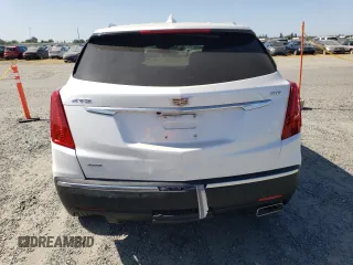 2017 Cadillac XT5 Luxury AWD with VIN 1GYKNDRS0HZ180703, listed as a Copart auction lot 58793895 with 30,339 mi miles and Salvage title. Bid and sale history available at DreamBid. Image 6.