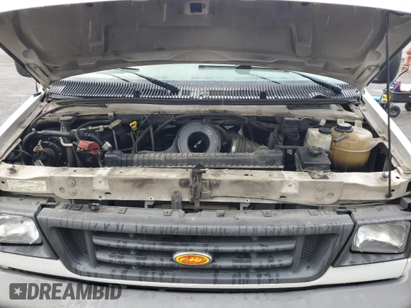 2007 Ford Econoline Cargo Commercial with VIN 1FTNE24LX7DA06575, listed as a Copart auction lot 68727304 with 187,344 mi miles and Salvage title. Bid and sale history available at DreamBid. Image 12.