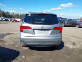 2016 Honda Pilot EX-L with VIN 5FNYF6H72GB097557, listed as a IAAI auction lot 41628145 with 155,151 mi miles. Bid and sale history available at carsss.com. Image 16.