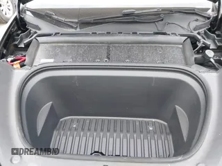2024 Tesla Model Y Performance z VIN 7SAYGDEF7RA267752, wystawiony jako IAAI lot #42126456 z przebiegiem 21 216 mil mil oraz . Historia ofert i sprzedaży dostępna na DreamBid. Obrazek 10.
