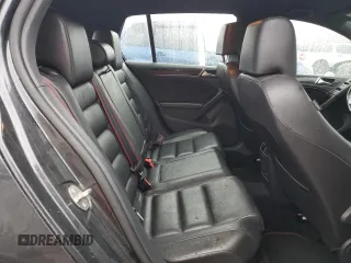 2013 Volkswagen GTI с VIN WVWGD7AJ3DW141277, выставлен на аукционе Copart как лот 51529385 с пробегом 75 137 миль миль и Списание • Salvage title. История ставок и продаж доступна на DreamBid. Изображение 10.
