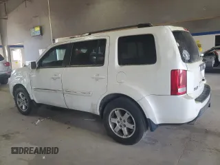 2011 Honda Pilot Touring z VIN 5FNYF3H91BB035074, wystawiony jako Copart lot #54789885 z przebiegiem 196 234 mil mil oraz Czysty tytuł • Clean title. Historia ofert i sprzedaży dostępna na DreamBid. Obrazek 2.