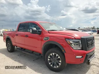 2024 Nissan Titan XD PRO-4X with VIN 1N6AA1FB9RN110722, listed as a Copart auction lot 64190064 with 4,732 mi miles and Salvage Title. Bid and sale history available at carsss.com. Image 4.