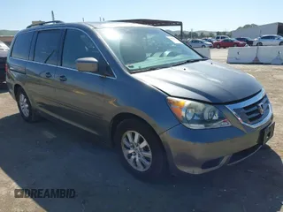 2010 Honda Odyssey EX-L with VIN 5FNRL3H69AB035471, listed as a IAAI auction lot 42046260 with 191,748 mi miles. Bid and sale history available at carsss.com. Image 1.