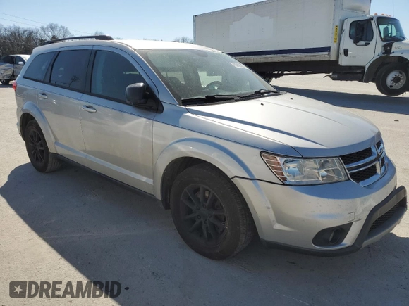 2014 Dodge Journey SXT with VIN 3C4PDCBB4ET124849, listed as a Copart auction lot 48590625 with 196,357 mi miles and Salvage Title. Bid and sale history available at DreamBid. Image 4.