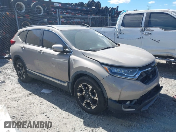 2018 Honda CR-V Touring with VIN 5J6RW1H98JL000031, listed as a IAAI auction lot 40605651 with 129,516 mi miles and . Bid and sale history available at DreamBid. Image 1.