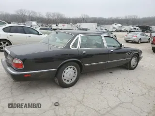 1999 Jaguar XJ z VIN SAJKD6043XC872105, wystawiony jako Copart lot #86270724 z przebiegiem Nie podano mil oraz Szkoda całkowita • Salvage title. Historia ofert i sprzedaży dostępna na DreamBid. Obrazek 3.