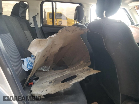 2015 Jeep Patriot Sport with VIN 1C4NJPBB0FD428386, listed as a Copart auction lot 53162285 with 101,892 mi miles and Salvage Title. Bid and sale history available at DreamBid. Image 11.