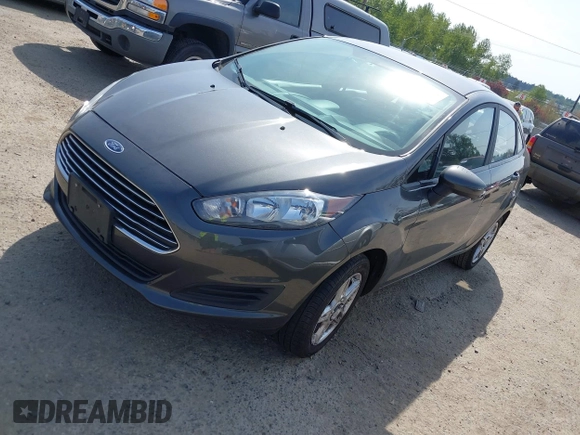 2018 Ford Fiesta SE with VIN 3FADP4BJ2JM101720, listed as a IAAI auction lot 42135936 with 122,061 mi miles. Bid and sale history available at carsss.com. Image 2.