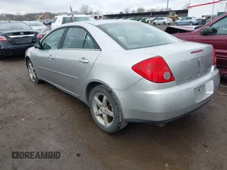 2006 Pontiac G6 6-Cyl with VIN 1G2ZG558464289212, listed as a IAAI auction lot 41994843 with 126,502 mi miles. Bid and sale history available at carsss.com. Image 3.