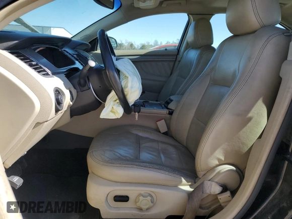 2013 Ford Taurus SEL with VIN 1FAHP2E95DG158872, listed as a Copart auction lot 50593795 with 177,696 mi miles and Salvage Title. Bid and sale history available at carsss.com. Image 7.