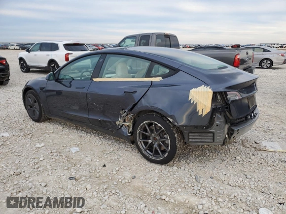 2022 Tesla Model 3 Long Range with VIN 5YJ3E1EB0NF269249, listed as a Copart auction lot 87318524 with 18,406 mi miles and Salvage Title. Bid and sale history available at DreamBid. Image 2.