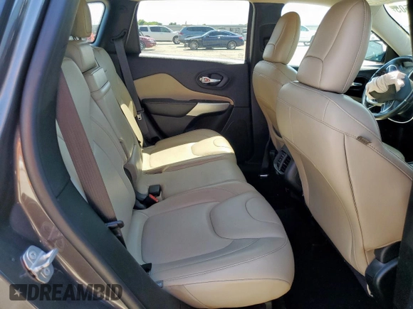 2018 Jeep Cherokee Limited z VIN 1C4PJLDX4JD556701, wystawiony jako Copart lot #58723505 z przebiegiem Nie podano mil oraz Szkoda całkowita • Salvage title. Historia ofert i sprzedaży dostępna na DreamBid. Obrazek 11.