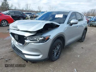 2020 Mazda CX-5 Touring with VIN JM3KFACM5L0768371, listed as a IAAI auction lot 41862623 with 138,446 mi miles and . Bid and sale history available at carsss.com. Image 17.