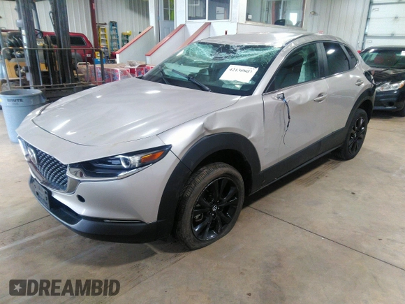 2024 Mazda CX-30 2.5 S Select Sport with VIN 3MVDMBBM0RM658069, listed as a IAAI auction lot 42130803 with 26,714 mi miles. Bid and sale history available at carsss.com. Image 2.