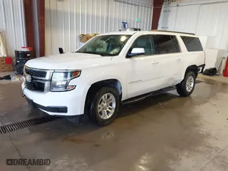 2018 Chevrolet Suburban LT with VIN 1GNSKHKC8JR211976, listed as a IAAI auction lot 40753333 with 156413 miles. Bid and sale history available at carsss.com. Image 19.