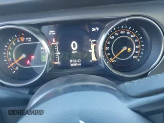 2021 Jeep Wrangler Unlimited Sport Altitude with VIN 1C4HJXDG8MW814044, listed as a IAAI auction lot 41437281 with 54,293 mi miles and . Bid and sale history available at DreamBid. Image 7.