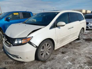 2014 Honda Odyssey Touring with VIN 5FNRL5H90EB098938, listed as a Copart auction lot 52751265 with 90,285 mi miles and Salvage title. Bid and sale history available at DreamBid. Image 1.