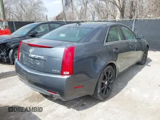 2009 Cadillac CTS RWD w/1SA with VIN 1G6DF577790133127, listed as a IAAI auction lot 41810358 with 220,278 mi miles. Bid and sale history available at carsss.com. Image 4.