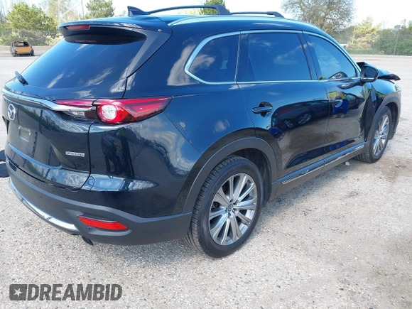 2021 Mazda CX-9 Signature with VIN JM3TCBEY1M0539786, listed as a IAAI auction lot 42264611 with 51,168 mi miles and . Bid and sale history available at DreamBid. Image 4.