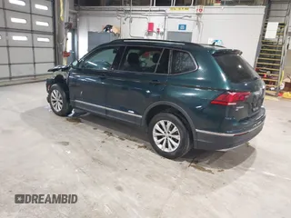 2018 Volkswagen Tiguan SEL with VIN 3VV2B7AX8JM113976, listed as a IAAI auction lot 42310576 with 100,319 mi miles and . Bid and sale history available at DreamBid. Image 3.