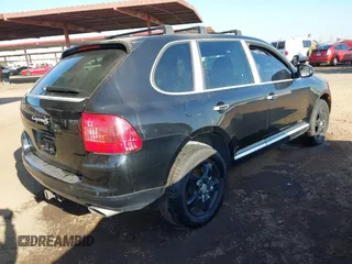 2005 Porsche Cayenne S with VIN WP1AB29P05LA63999, listed as a IAAI auction lot 41479500 with 157,957 mi miles. Bid and sale history available at carsss.com. Image 4.