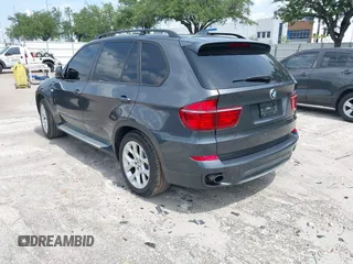 2012 BMW X5 35i z VIN 5UXZV4C5XCL990728, wystawiony jako IAAI lot #42386095 z przebiegiem 124 613 mil mil oraz . Historia ofert i sprzedaży dostępna na DreamBid. Obrazek 3.