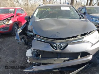 2016 Toyota RAV4 LE with VIN JTMBFREV1GJ085659, listed as a IAAI auction lot 41823575 with 141,657 mi miles. Bid and sale history available at carsss.com. Image 13.