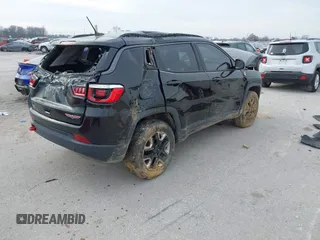 2018 Jeep Compass Trailhawk with VIN 3C4NJDDB6JT442016, listed as a IAAI auction lot 41068443 with 114,579 mi miles and . Bid and sale history available at carsss.com. Image 4.