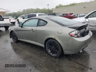 2008 Hyundai Tiburon GS z VIN KMHHM66D18U264820, wystawiony jako Copart lot #54485415 z przebiegiem 158 129 mil mil oraz Szkody całkowita. Historia ofert i sprzedaży dostępna na DreamBid. Obrazek 2.
