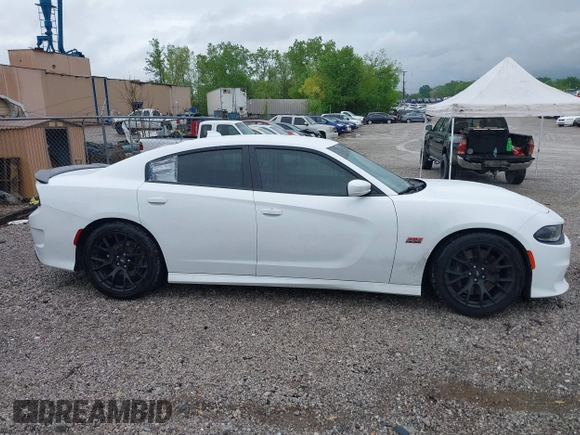 2019 Dodge Charger Scat Pack with VIN 2C3CDXGJ9KH691136, listed as a IAAI auction lot 42056137 with 78,814 mi miles and . Bid and sale history available at DreamBid. Image 13.