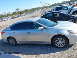 2016 Nissan Altima SV with VIN 1N4AL3AP5GC197187, listed as a IAAI auction lot 41649894 with 244,298 mi miles and . Bid and sale history available at DreamBid. Image 13.