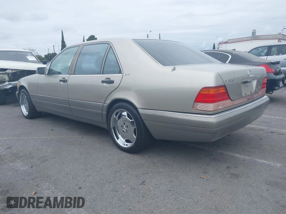 1996 Mercedes-Benz S with VIN WDBGA57E8TA318326, listed as a IAAI auction lot 42072979 with 97,504 mi miles and . Bid and sale history available at DreamBid. Image 3.