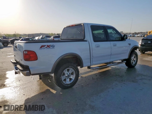 2002 Ford F-150 XLT with VIN 1FTRW08692KD89789, listed as a Copart auction lot 52621555 with 150,012 mi miles and Salvage Title. Bid and sale history available at carsss.com. Image 3.