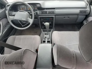 1991 Toyota Camry DLX z VIN 4T1SV21E0MU450578, wystawiony jako Copart lot #73990024 z przebiegiem 149 342 mil mil oraz Czysty tytuł • Clean title. Historia ofert i sprzedaży dostępna na DreamBid. Obrazek 8.