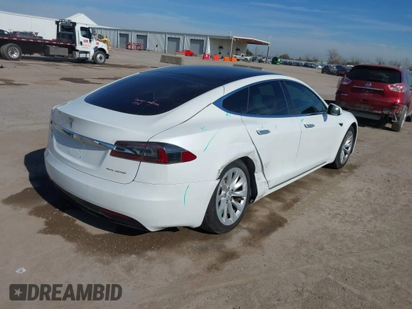 2020 Tesla Model S Long Range with VIN 5YJSA1E23LF360441, listed as a IAAI auction lot 41312865 with 68,967 mi miles and . Bid and sale history available at DreamBid. Image 6.