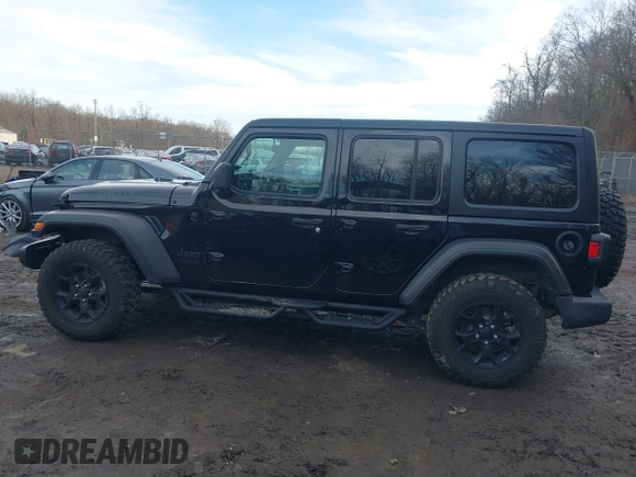 2022 Jeep Wrangler Unlimited Sport S with VIN 1C4HJXDG1NW141244, listed as a IAAI auction lot 41532388 with 27,829 mi miles. Bid and sale history available at carsss.com. Image 14.