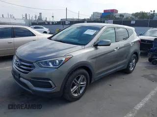 2018 Hyundai Santa Fe 2.4L with VIN 5NMZT3LB4JH069868, listed as a IAAI auction lot 42675555 with 142,612 mi miles and . Bid and sale history available at DreamBid. Image 2.