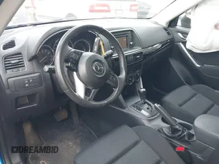 2013 Mazda CX-5 Touring with VIN JM3KE4CE0D0160711, listed as a IAAI auction lot 41843658 with 65,391 mi miles. Bid and sale history available at carsss.com. Image 5.