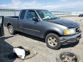 2003 Ford F-150 XL with VIN 1FTRX17L43NA66874, listed as a Copart auction lot 50741395 with 196,161 mi miles and Salvage title. Bid and sale history available at DreamBid. Image 4.