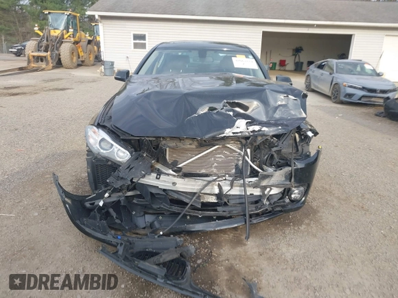 2014 BMW 5 Series 528i xDrive with VIN WBA5A7C52ED616976, listed as a IAAI auction lot 42067334 with 98,286 mi miles and . Bid and sale history available at DreamBid. Image 12.