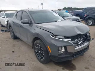 2023 Hyundai Santa Cruz SEL z VIN 5NTJBDAEXPH062536, wystawiony jako IAAI lot #41506951 z przebiegiem 46 421 mil mil oraz . Historia ofert i sprzedaży dostępna na DreamBid. Obrazek 1.