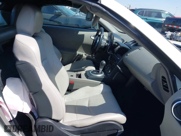 2005 Nissan 350Z Touring z VIN JN1AZ36A45M759863, wystawiony jako IAAI lot #41989643 z przebiegiem 36 758 mil mil oraz . Historia ofert i sprzedaży dostępna na DreamBid. Obrazek 5.