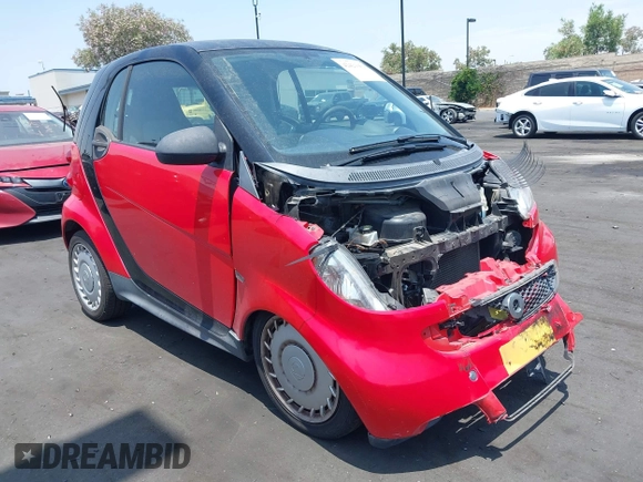 2014 Smart fortwo Pure z VIN WMEEJ3BAXEK744079, wystawiony jako IAAI lot #42421069 z przebiegiem 79 788 mil mil oraz . Historia ofert i sprzedaży dostępna na DreamBid. Obrazek 1.