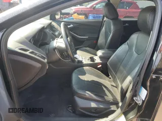 2014 Ford Focus Titanium with VIN 1FADP3N27EL251229, listed as a Copart auction lot 62201195 with 75,534 mi miles and Salvage title. Bid and sale history available at DreamBid. Image 7.