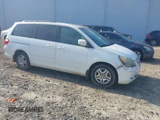 2007 Honda Odyssey EX-L z VIN 5FNRL38617B415770, wystawiony jako IAAI lot #42208632 z przebiegiem 269 375 mil mil oraz . Historia ofert i sprzedaży dostępna na DreamBid. Obrazek 1.
