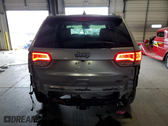 2015 Jeep Grand Cherokee High Altitude with VIN 1C4RJECG7FC781715, listed as a Copart auction lot 73321744 with 0 mi miles and Salvage Title. Bid and sale history available at carsss.com. Image 6.